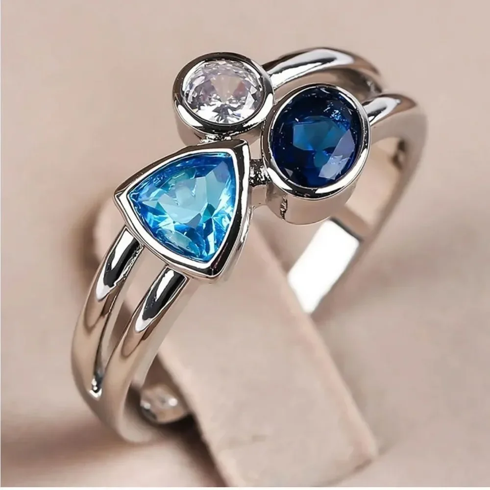 The Shades of blue ring in 925 silver and lab created gem stones sz 5